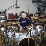 Picture of Magnús Freyr at his drum set in Studio Sundlaugin