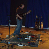 Ragnar Benediktsson playing the guitar at Studio Hljóðriti