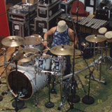 Magnús Freyr sitting at his drum set showing the mic set-up at Studio Sundlaugin